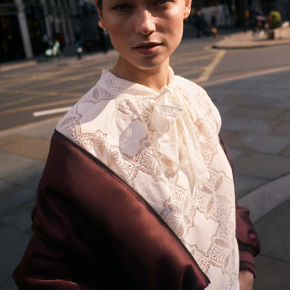 Mos Mosh Tamlyn ecru sheer lace tie neck blouse styled outdoors