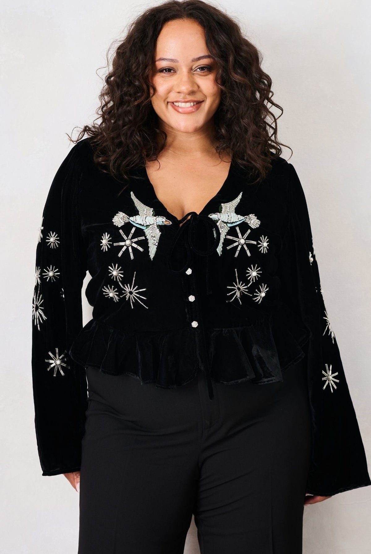 Hope & Ivy Glacia black velvet bird embellished top – front curve model view
