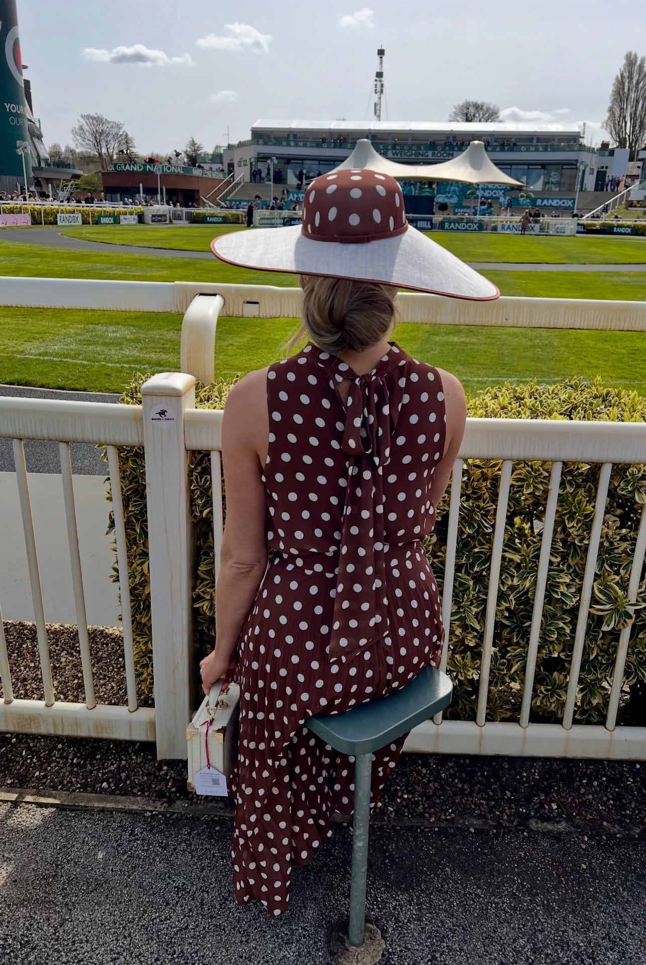 8th Sign Milly brown polka dot pleated midi dress styled for the races
