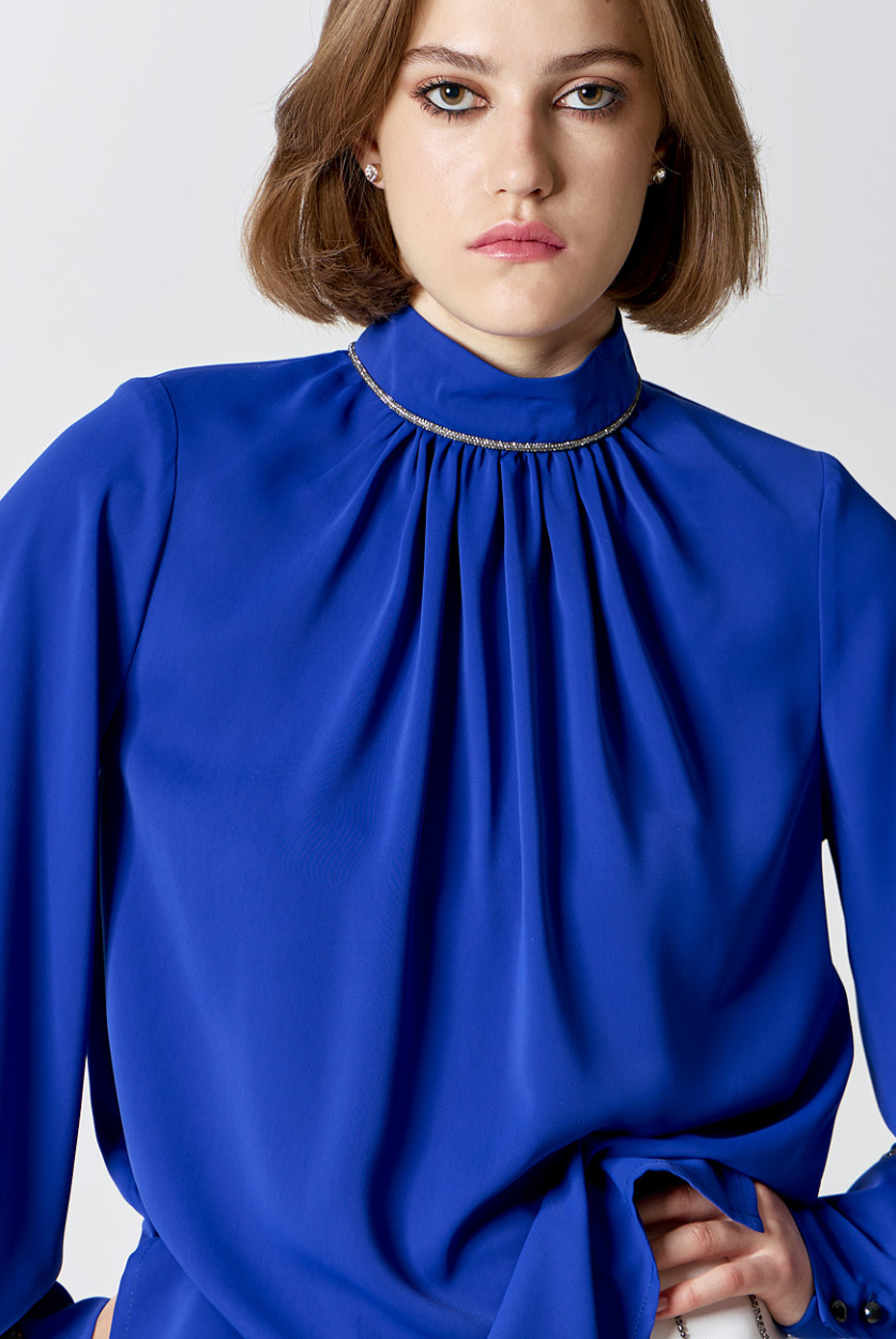 . Access Fashion cobalt blue wide sleeve blouse with diamanté high neck
