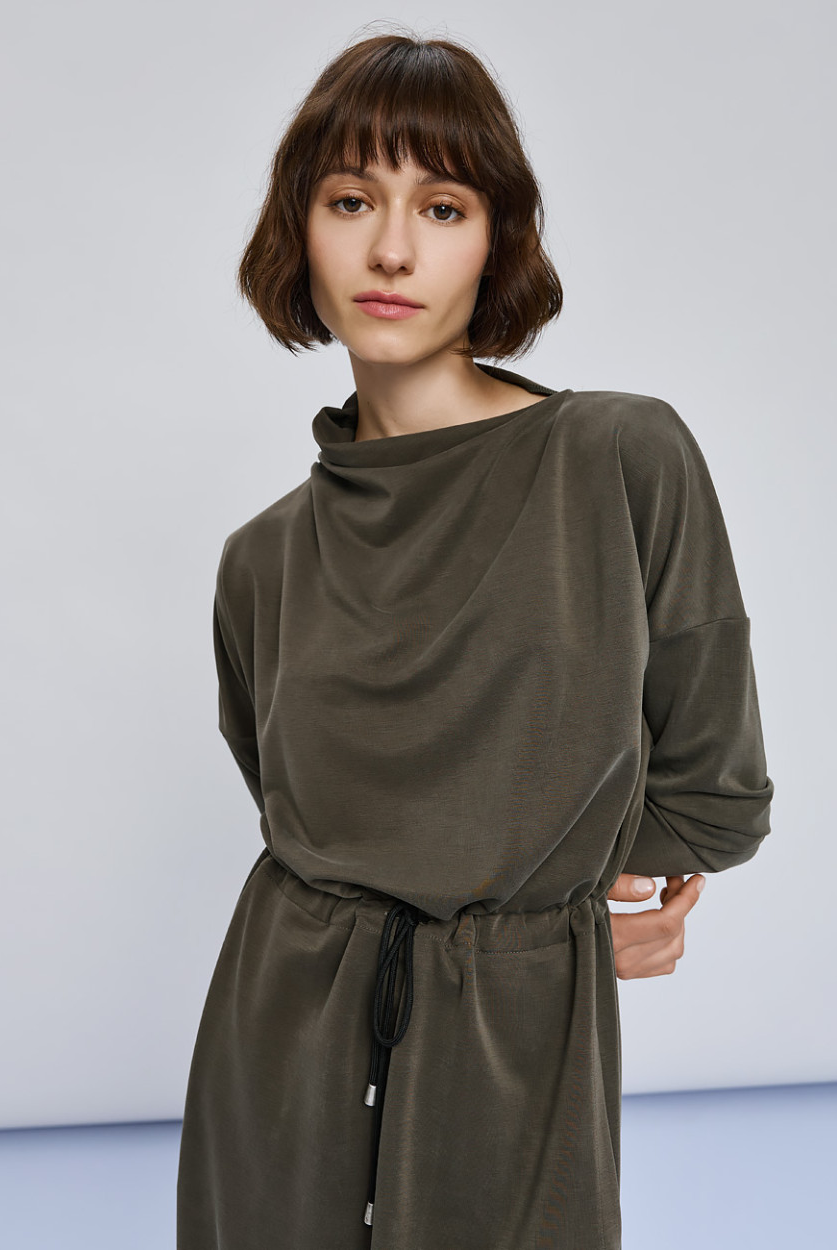 Access Fashion khaki dress close up of draped turtleneck and drawstring waist detail