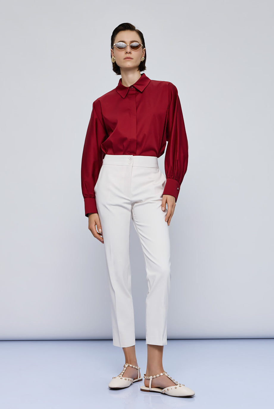 Access Fashion red puff sleeve shirt with white trousers and flats