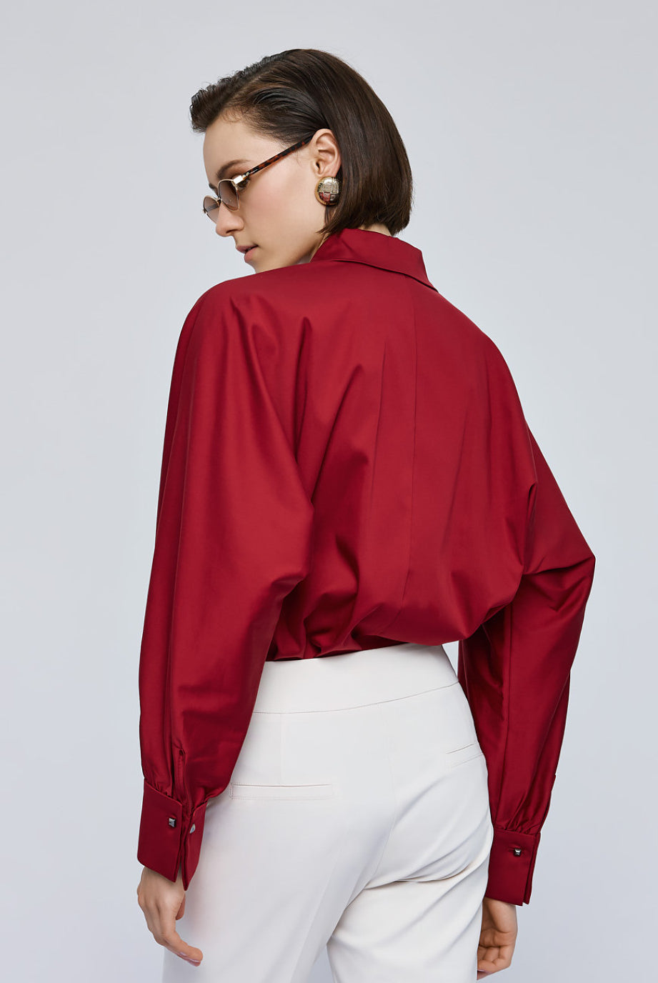 Back view of Access Fashion red wide sleeve shirt