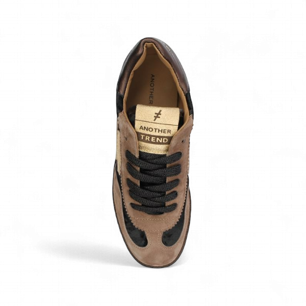 Side view of Another Trend beige trainers with black suede panels