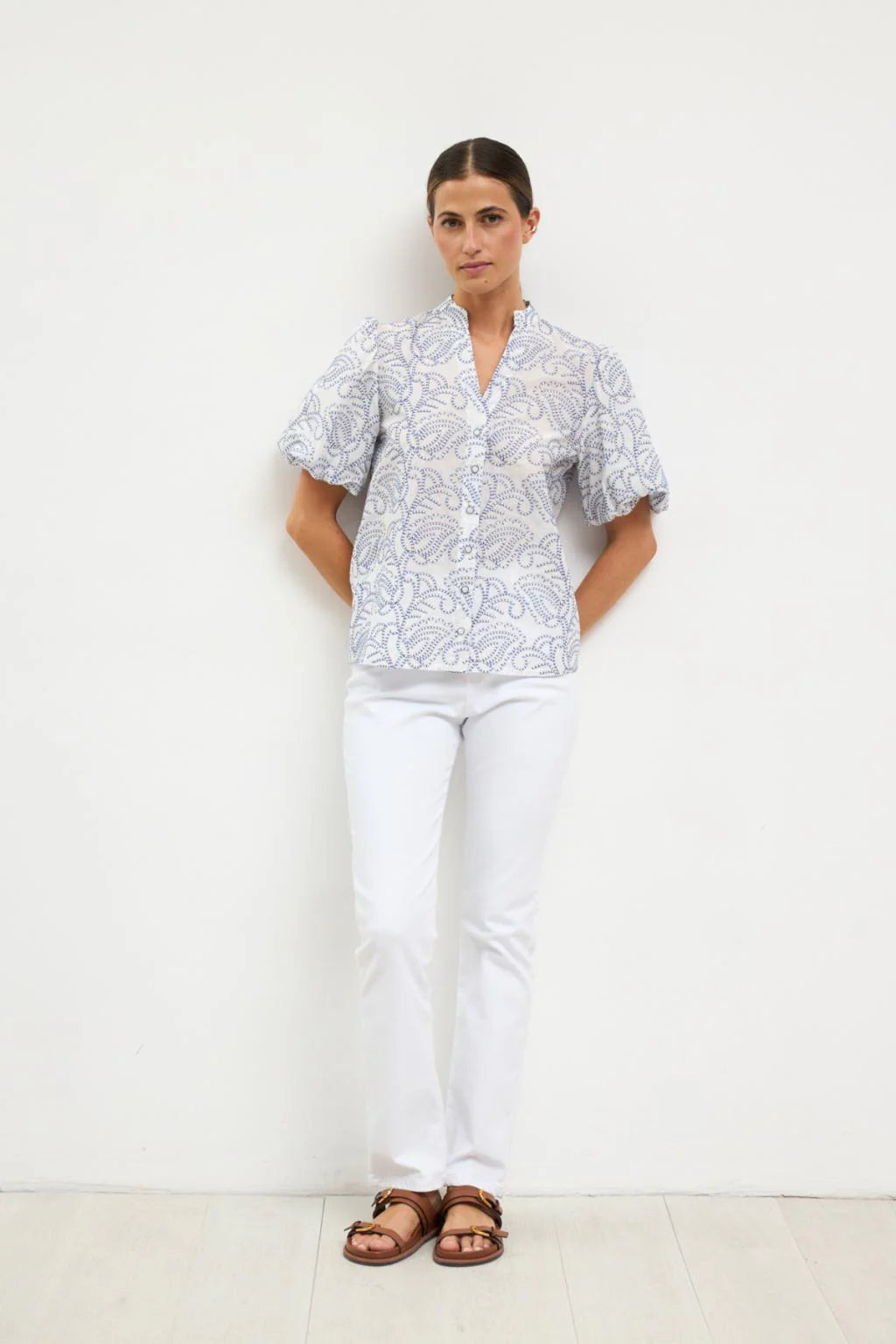 Bariloche white embroidered blouse puff sleeve detail with white jeans