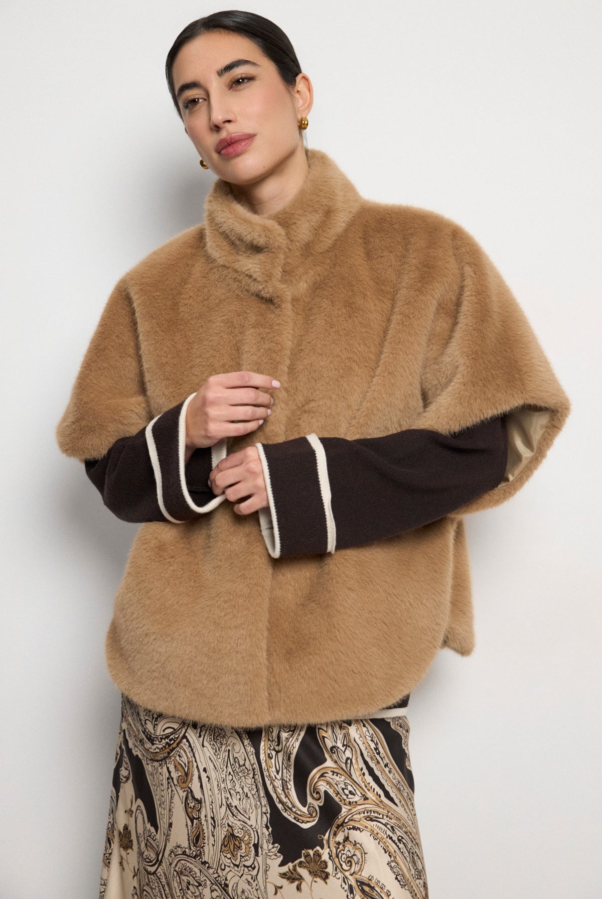 Bariloche Aris camel faux fur elbow sleeve cape coat styled on model