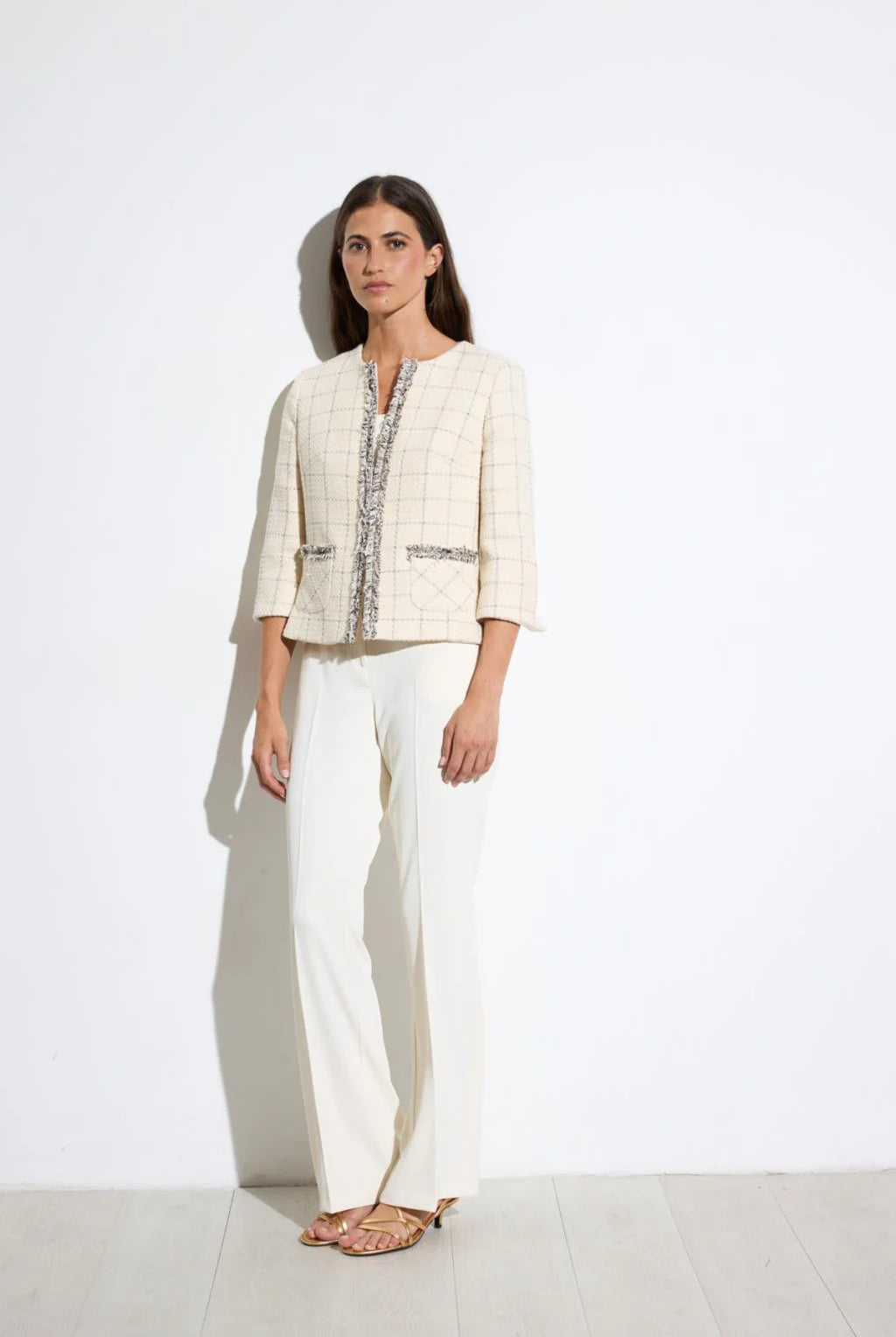 Bariloche Carrascal tweed fringed jacket styled with trousers