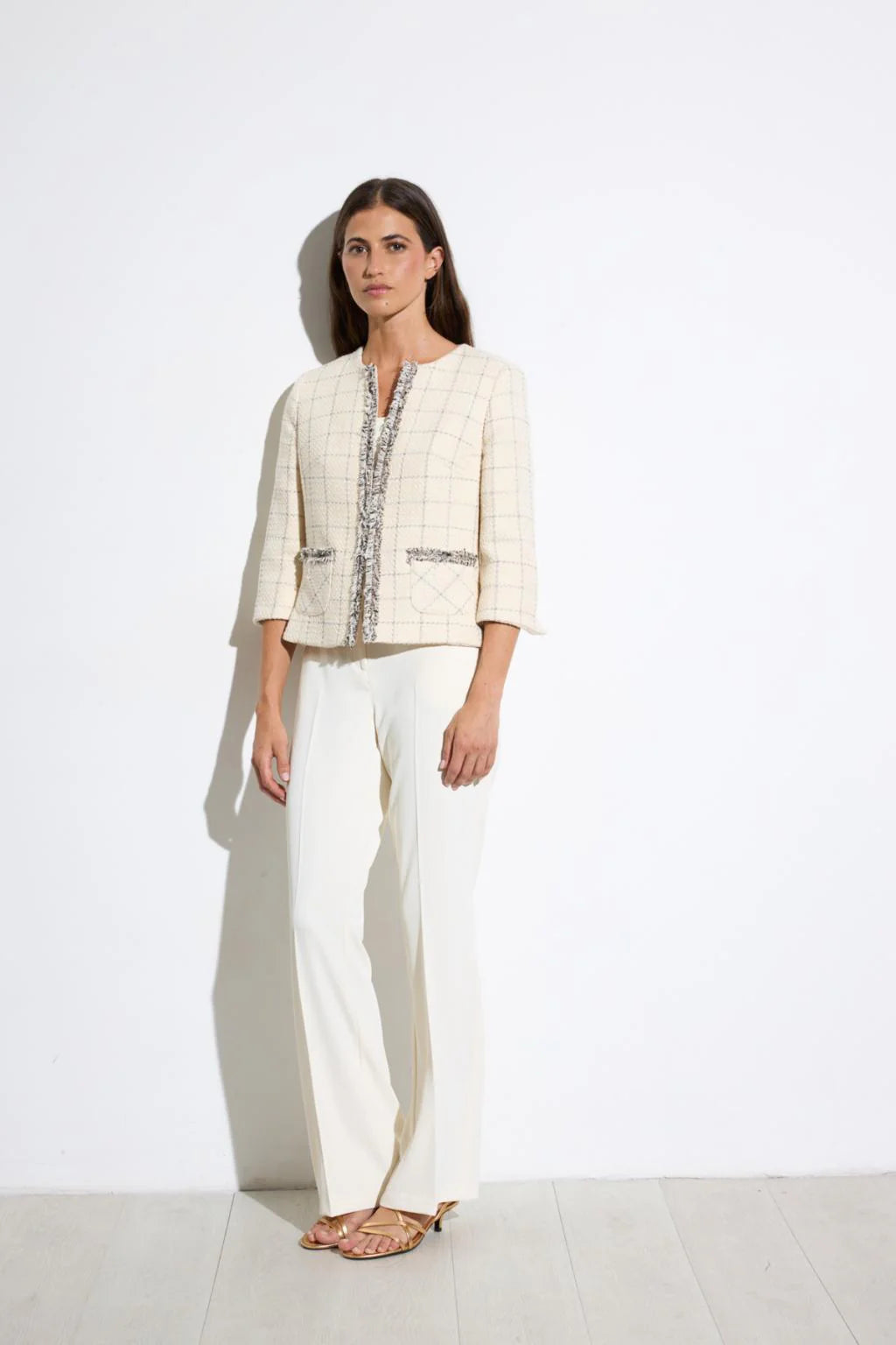 Bariloche Carrascal tweed fringed jacket styled with trousers