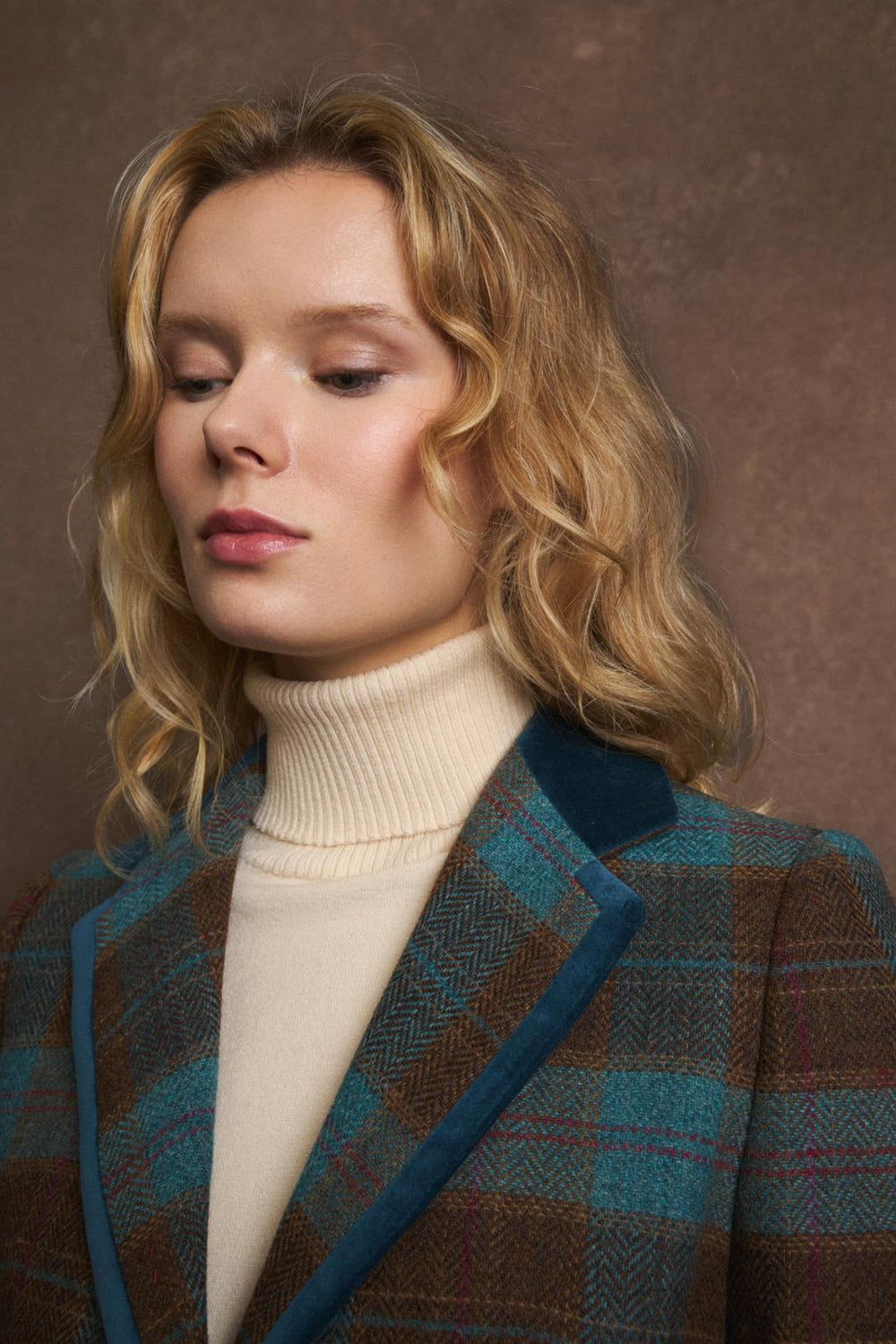 Close-up of velvet trim on Bariloche blazer lapel and collar