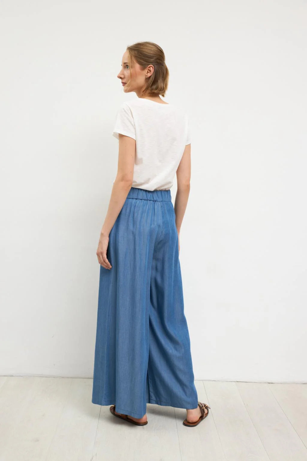Bariloche Jura blue high waisted wide leg trousers back view
