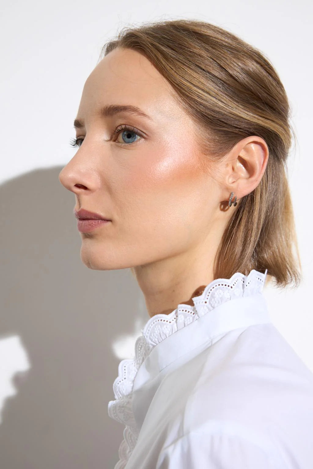 Bariloche Troya white blouse with scalloped openwork collar detail close up