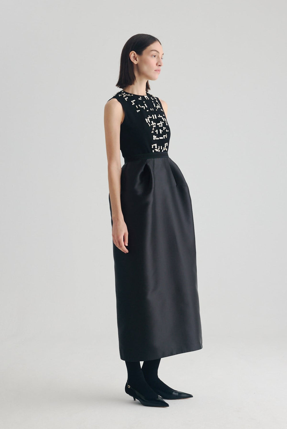 Black embellished midi dress with structured tulip skirt