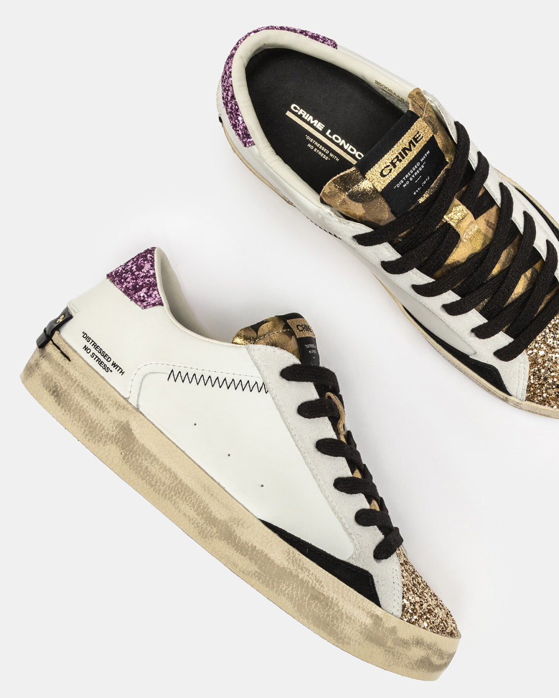 Crime London Gold Rush glitter trainers with camo-style tongue and contrast black places