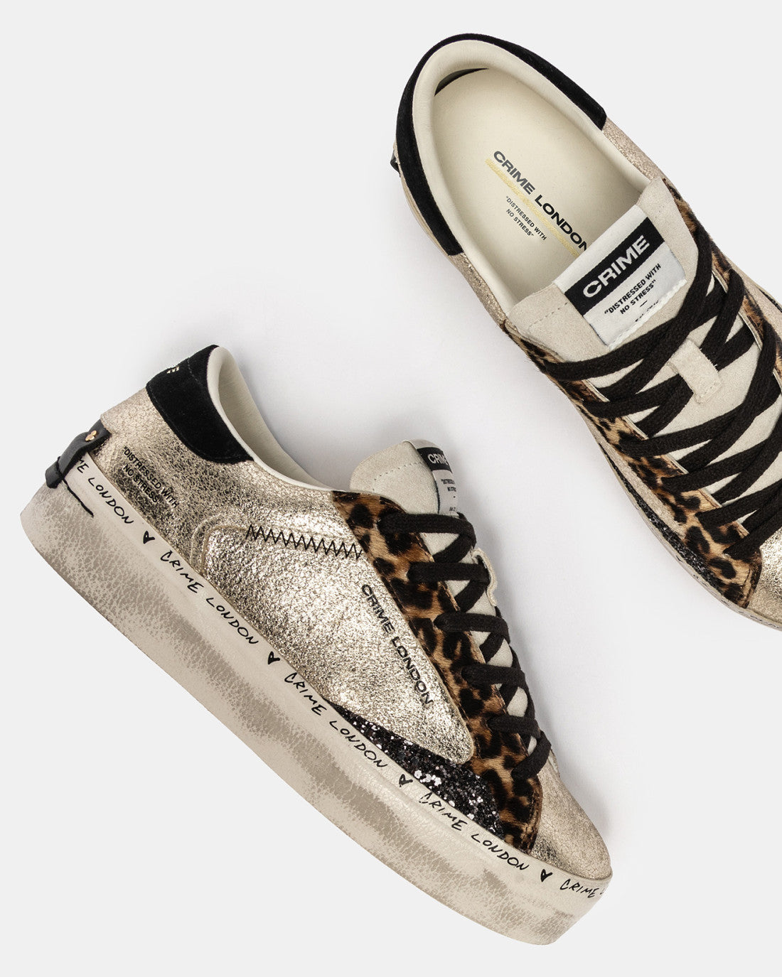 Close-up of laces and tongue label on Crime London Like Honey fashion trainers