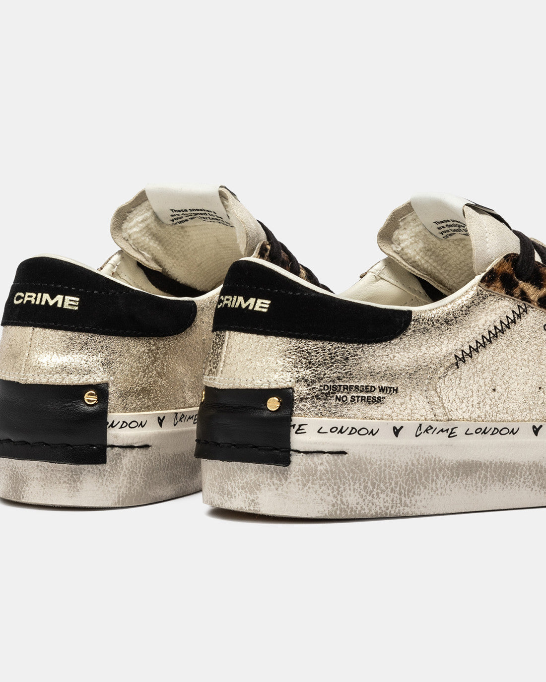 Rear angle of Crime London platform trainers with vintage detailing