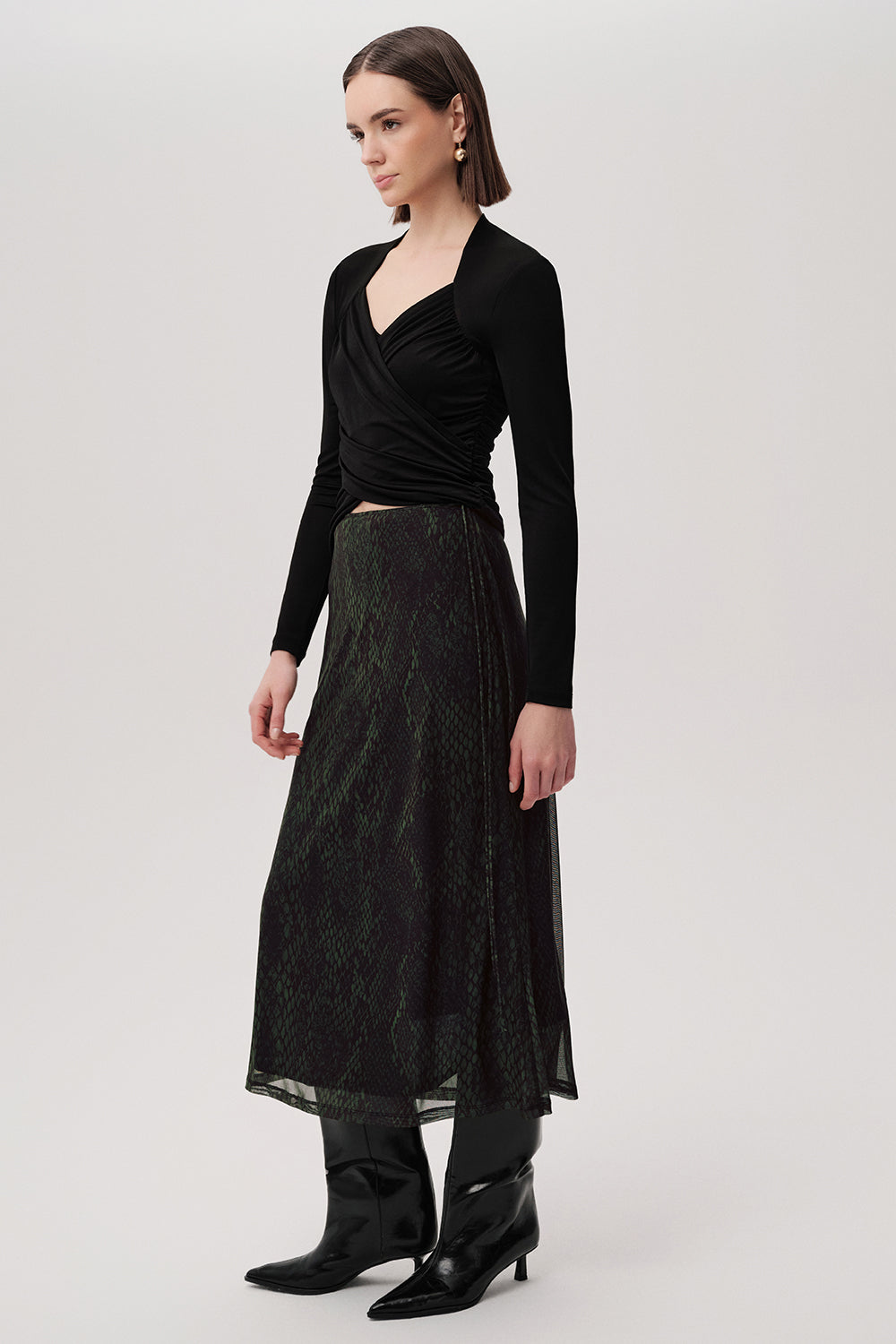 Exquise Linda K green midi skirt – back view with lightweight drape and lining