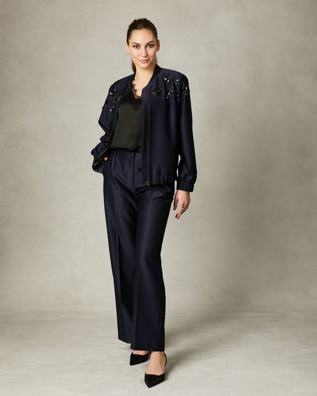 Fee G Avery navy wide-leg trousers in satin twill fabric.