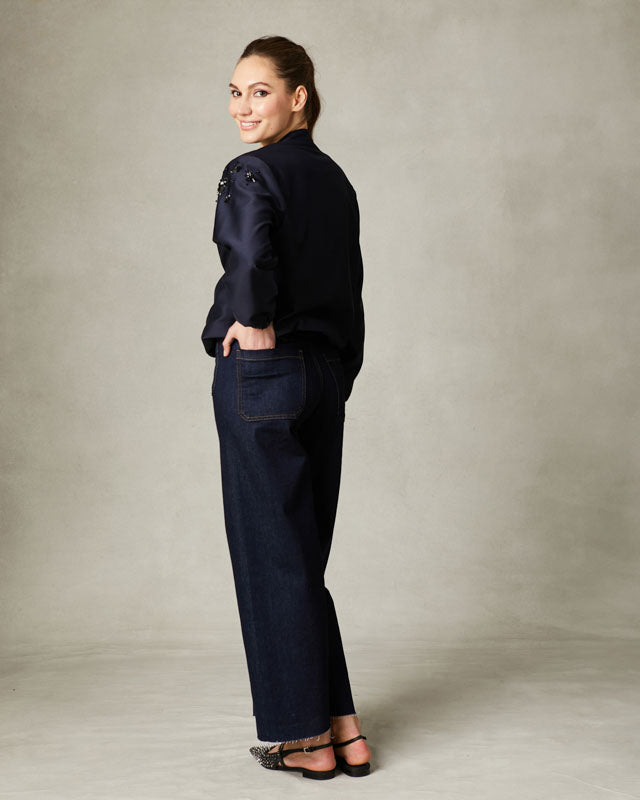 Fee G Iris bomber styled with wide-leg trousers for chic athleisure co-ord look.