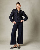 Fee G Iris navy satin bomber jacket with beaded sparkle.