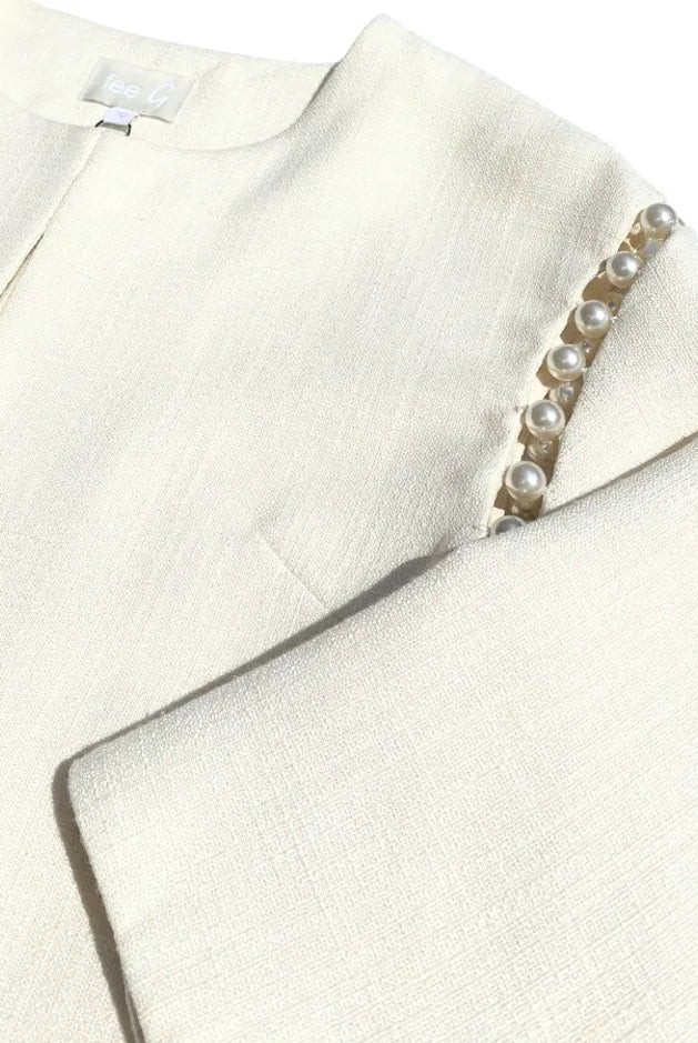 Fee G pearl sleeve detail close-up on Nancy jacket