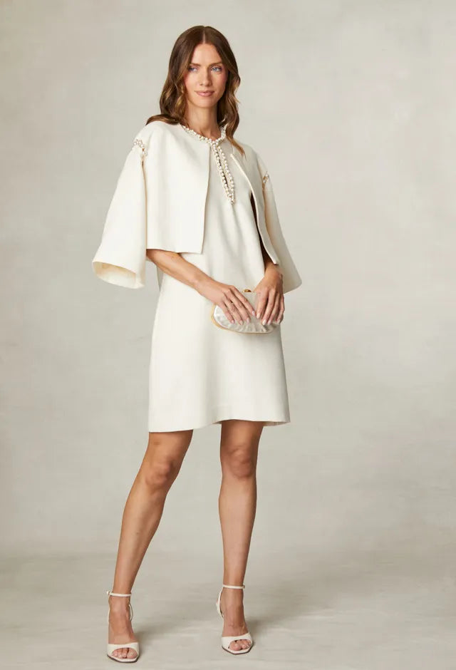 Fee G Nancy cream jacket worn over dress for occasion styling
