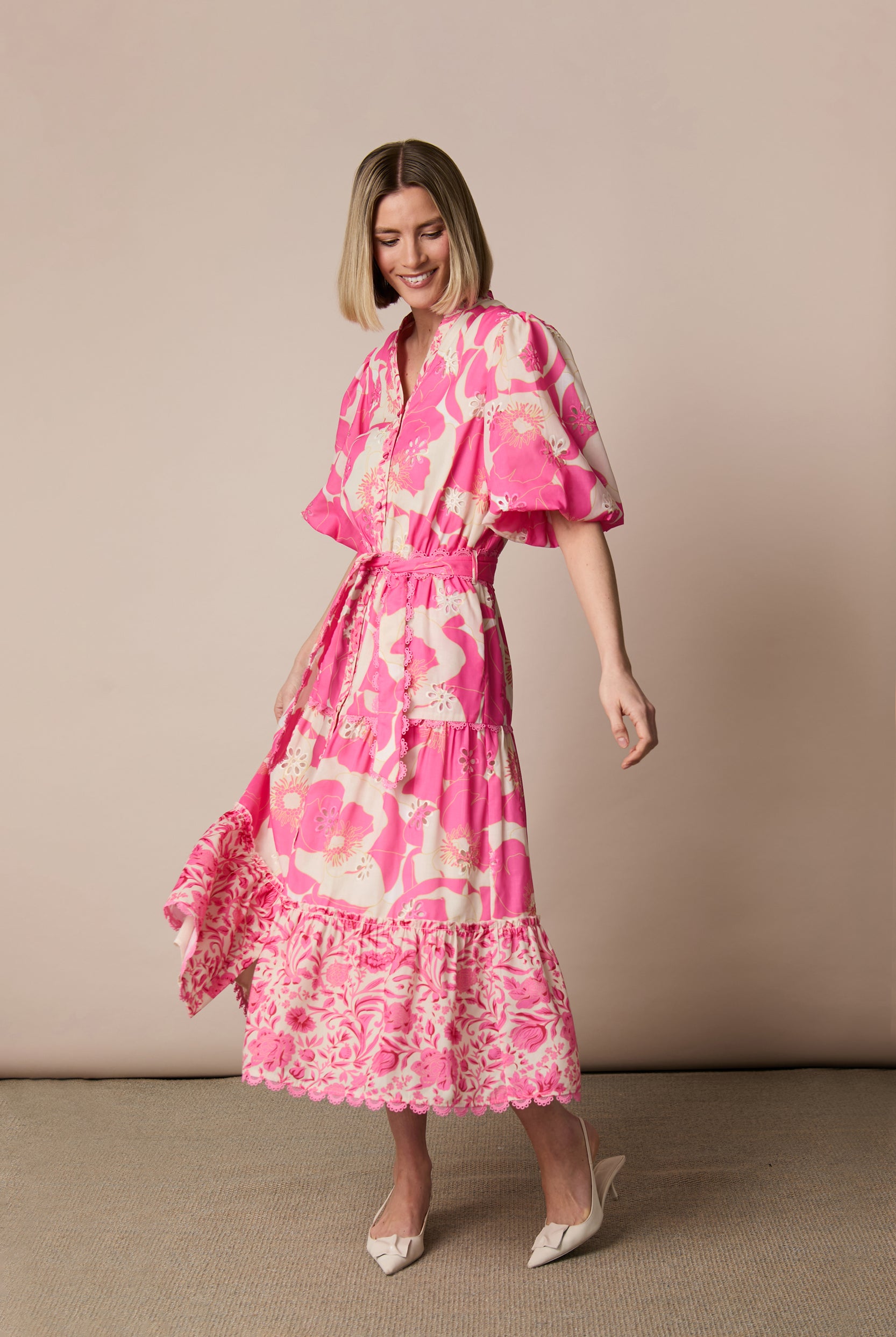 Side view of Fee G Eve floral midi dress with pockets