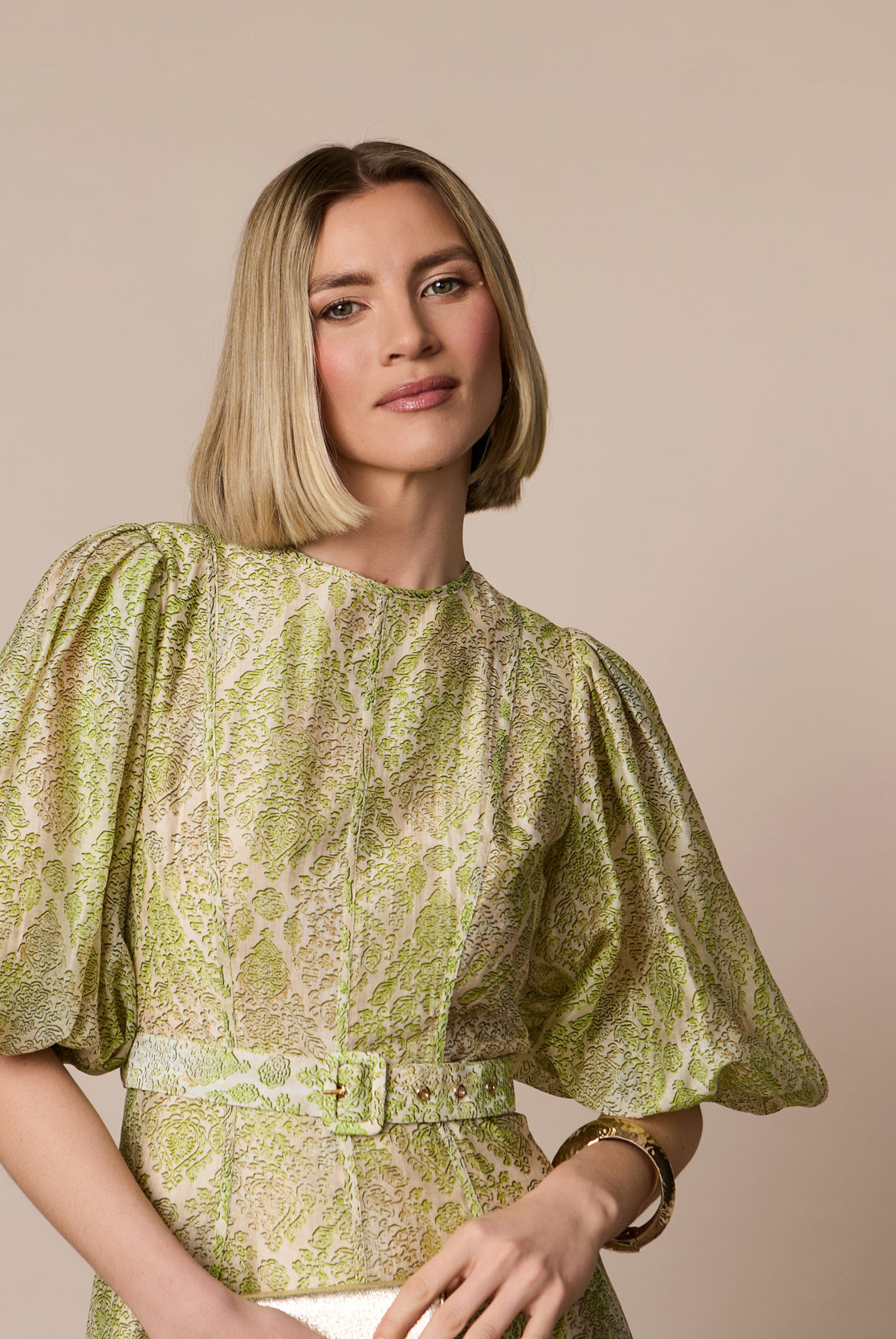 Fee G Kate green paisley midi dress showing puff sleeves and fitted waist