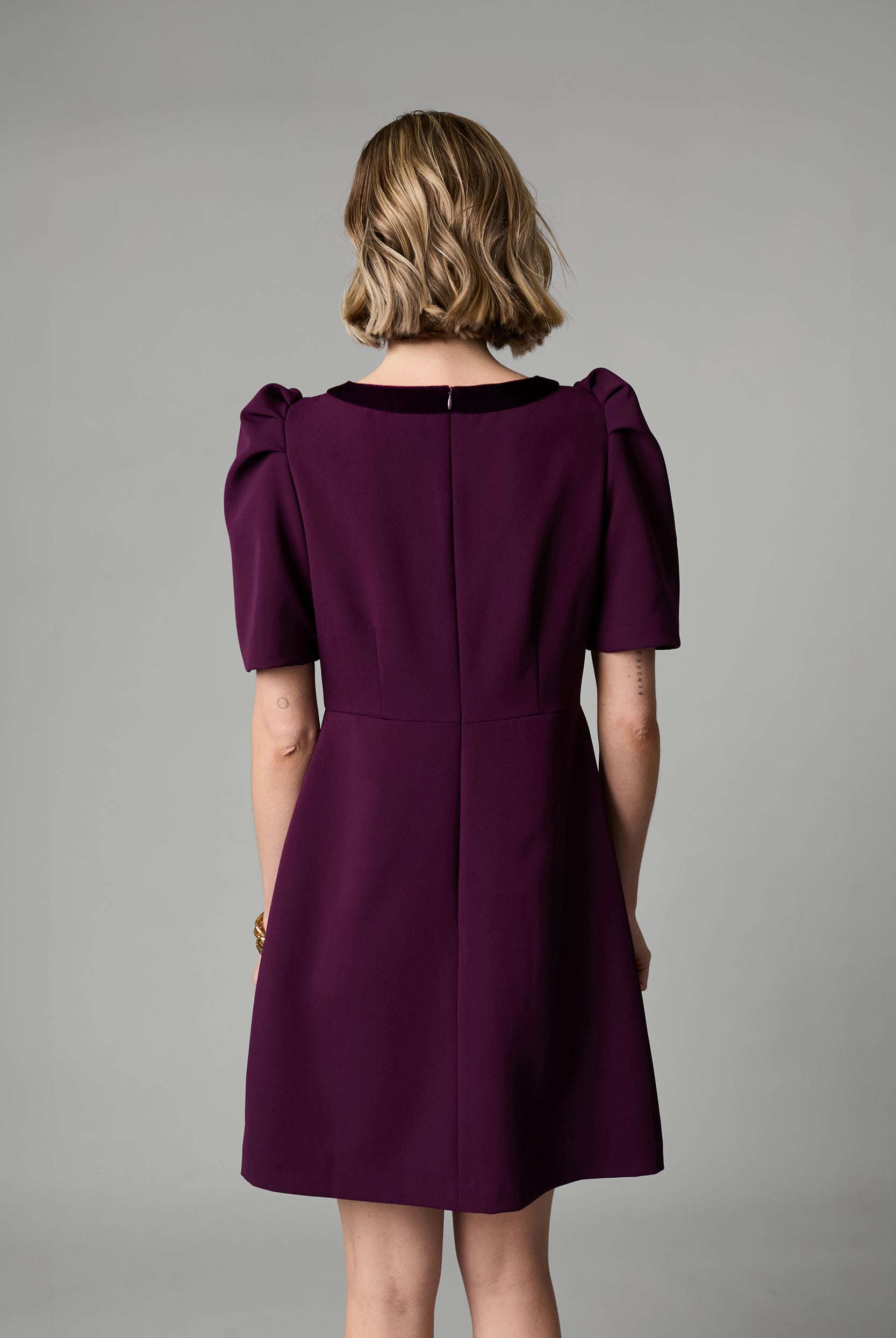 Fee G Sara burgundy velvet bow detail mini dress styled for occasion wear