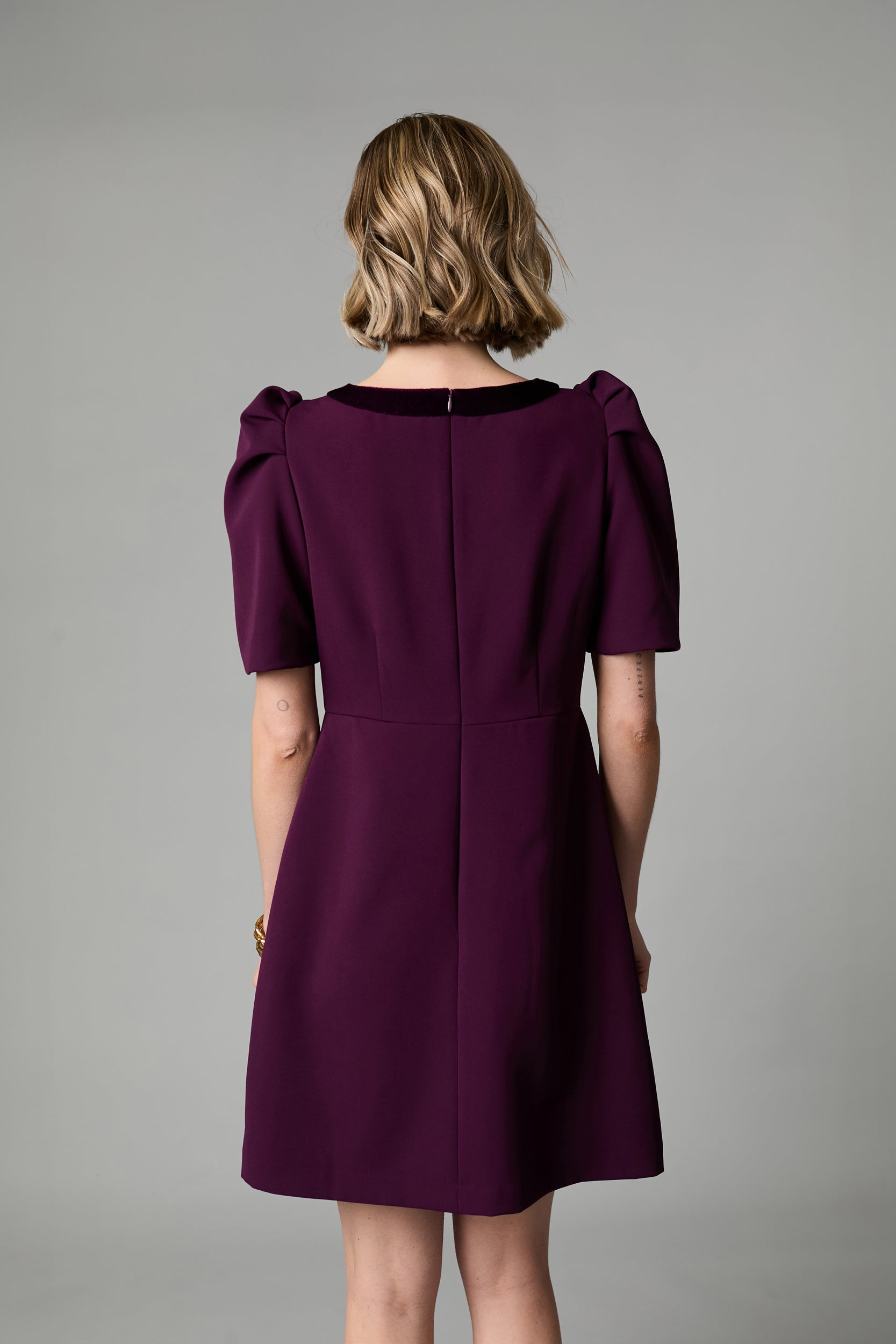 Fee G Sara burgundy velvet bow detail mini dress styled for occasion wear