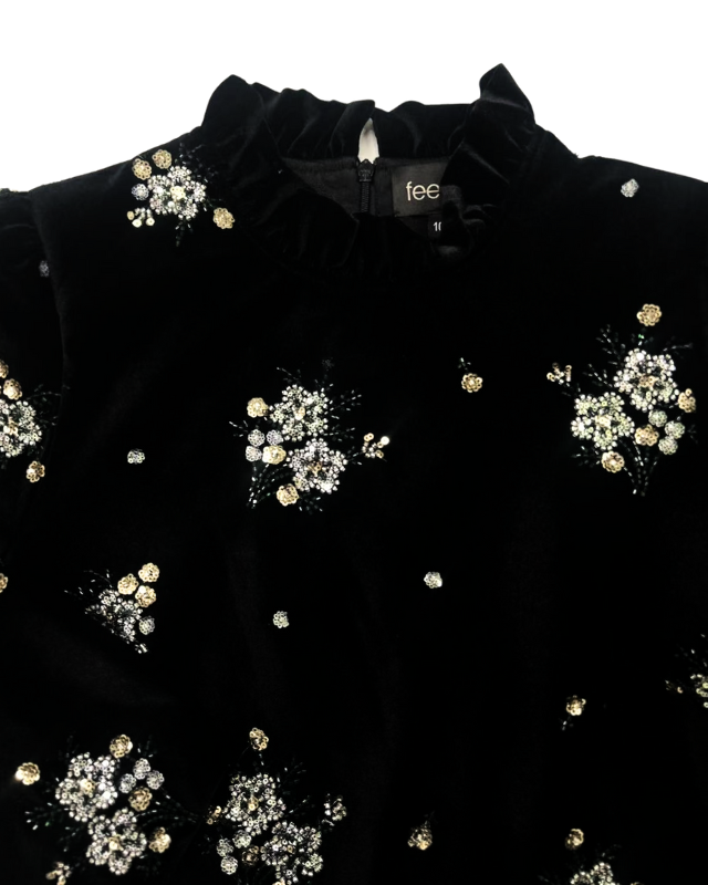 Close-up of beadwork and frilled collar on Fee G Astrid dress