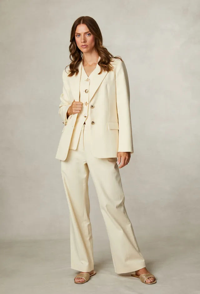 Fee G Jade lemon yellow waistcoat styled with matching cream tailored trousers