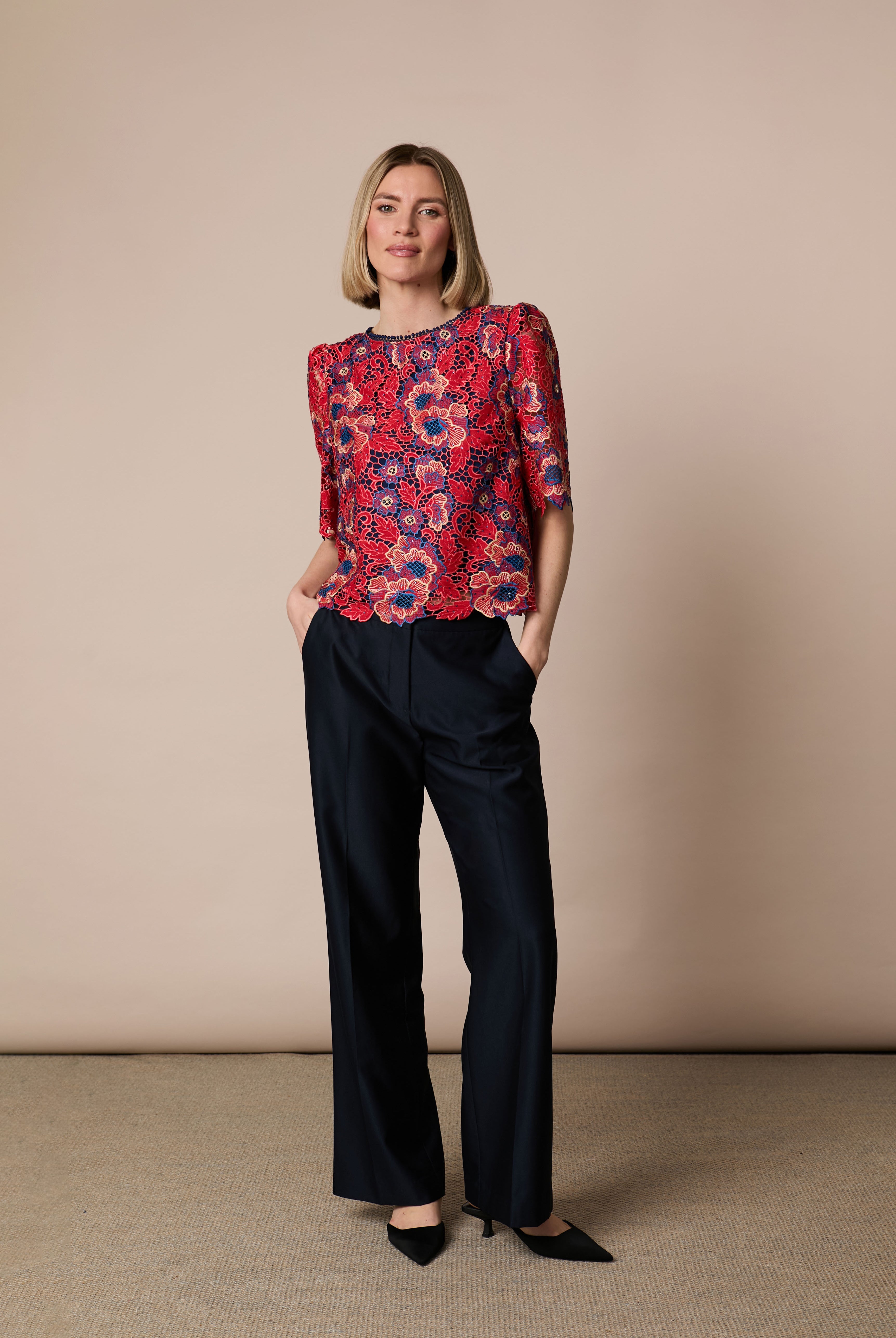 Fee G Lori red navy floral lace bow back top styled with trousers