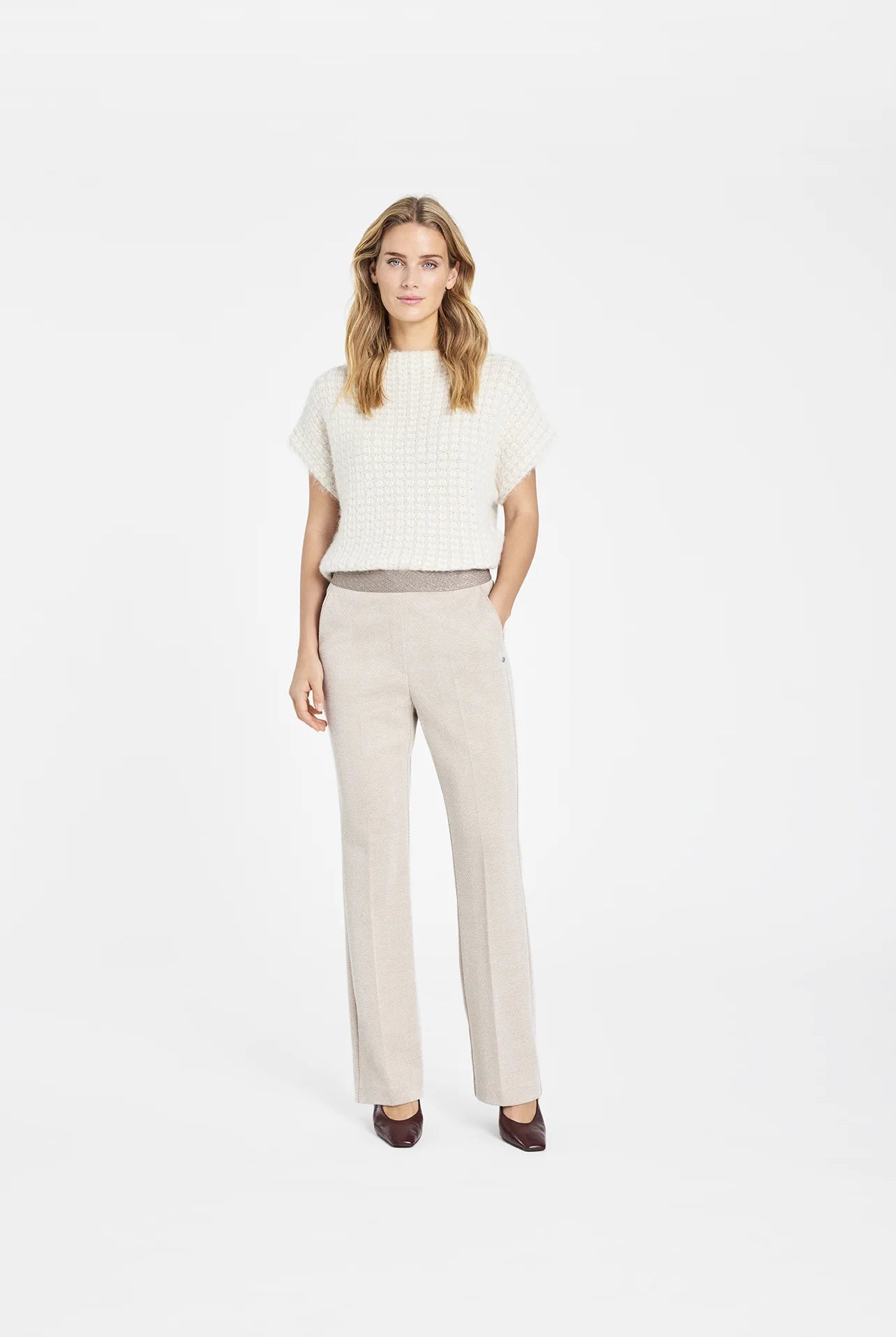 Gustav Marit jersey trousers worn front view with straight leg silhouette in neutral tone