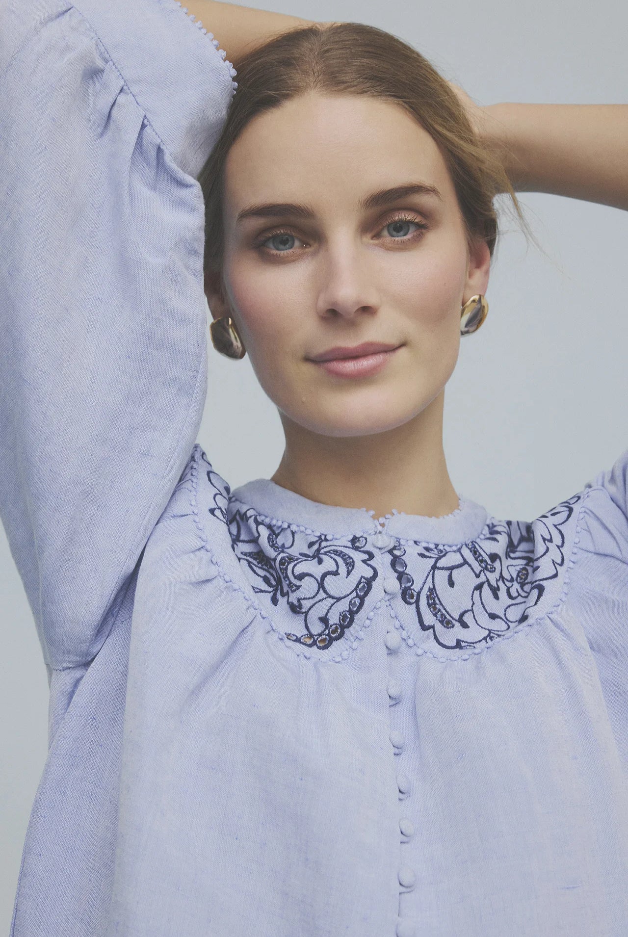 Gustav blue blouse embroidered neckline detail