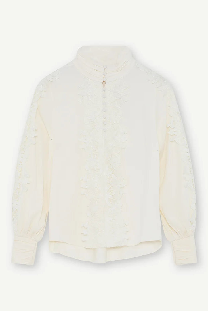 Gustav Cana off-white lace blouse with high neckline, long sleeves and floral lace detailing – back view