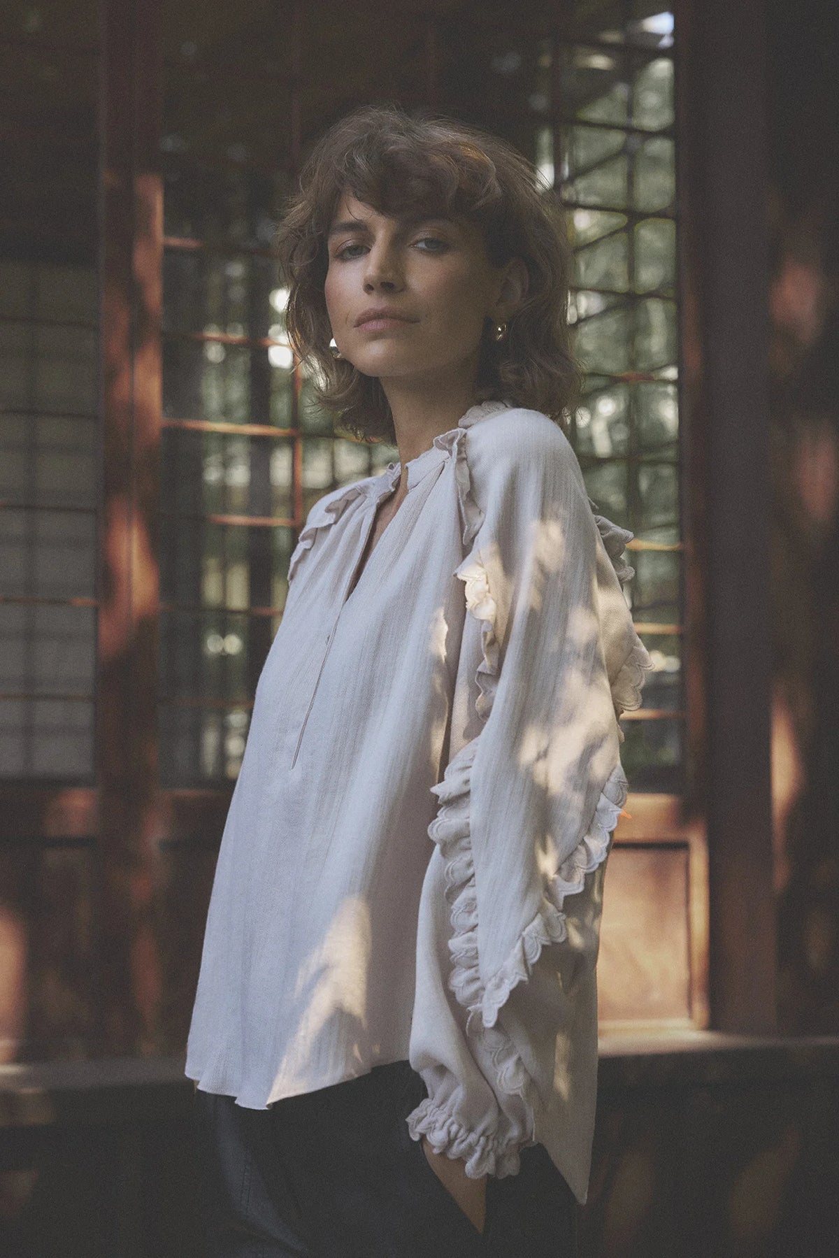 Gustav Annsofie ruffle sleeve blouse in soft almond worn by model