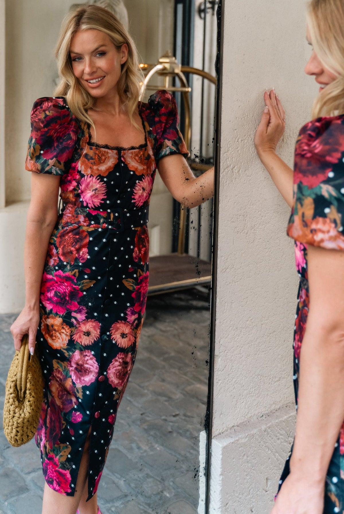 Hope & Ivy Rinna black floral wedding guest midi dress – front lifestyle view