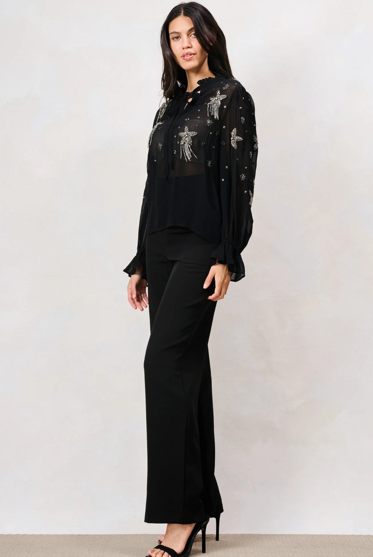 Hope & Ivy Elaris black beaded mesh party top with keyhole neckline – three-quarter model view