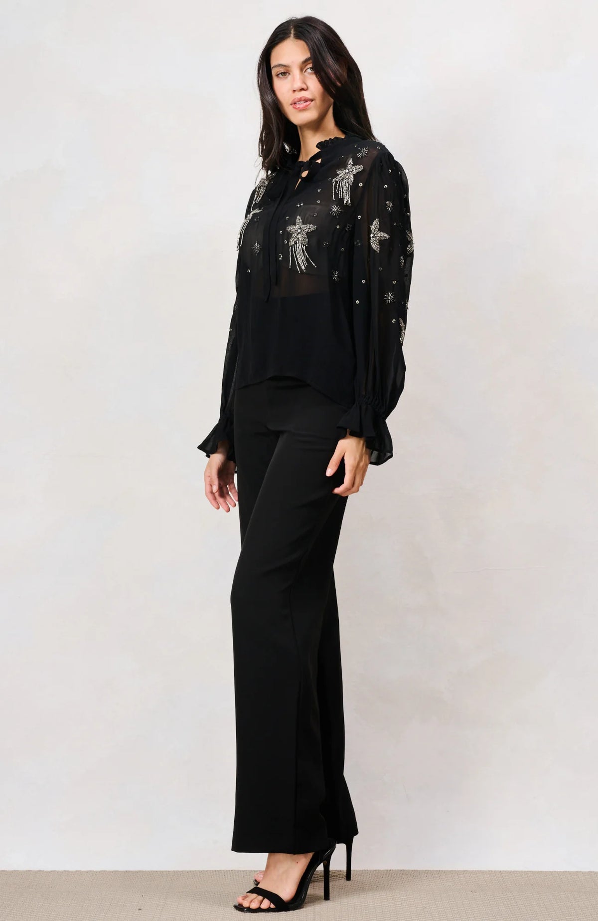 Hope & Ivy Elaris black beaded mesh party top with keyhole neckline – three-quarter model view