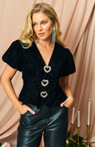 Hope & Ivy Layla black velvet party top with puff sleeves and heart bow detail