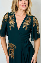 Close-up of Hope & Ivy Matilda gold embroidery on sleeve and waist