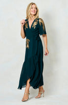 Hope & Ivy Matilda winter maxi dress styled with neutral heels