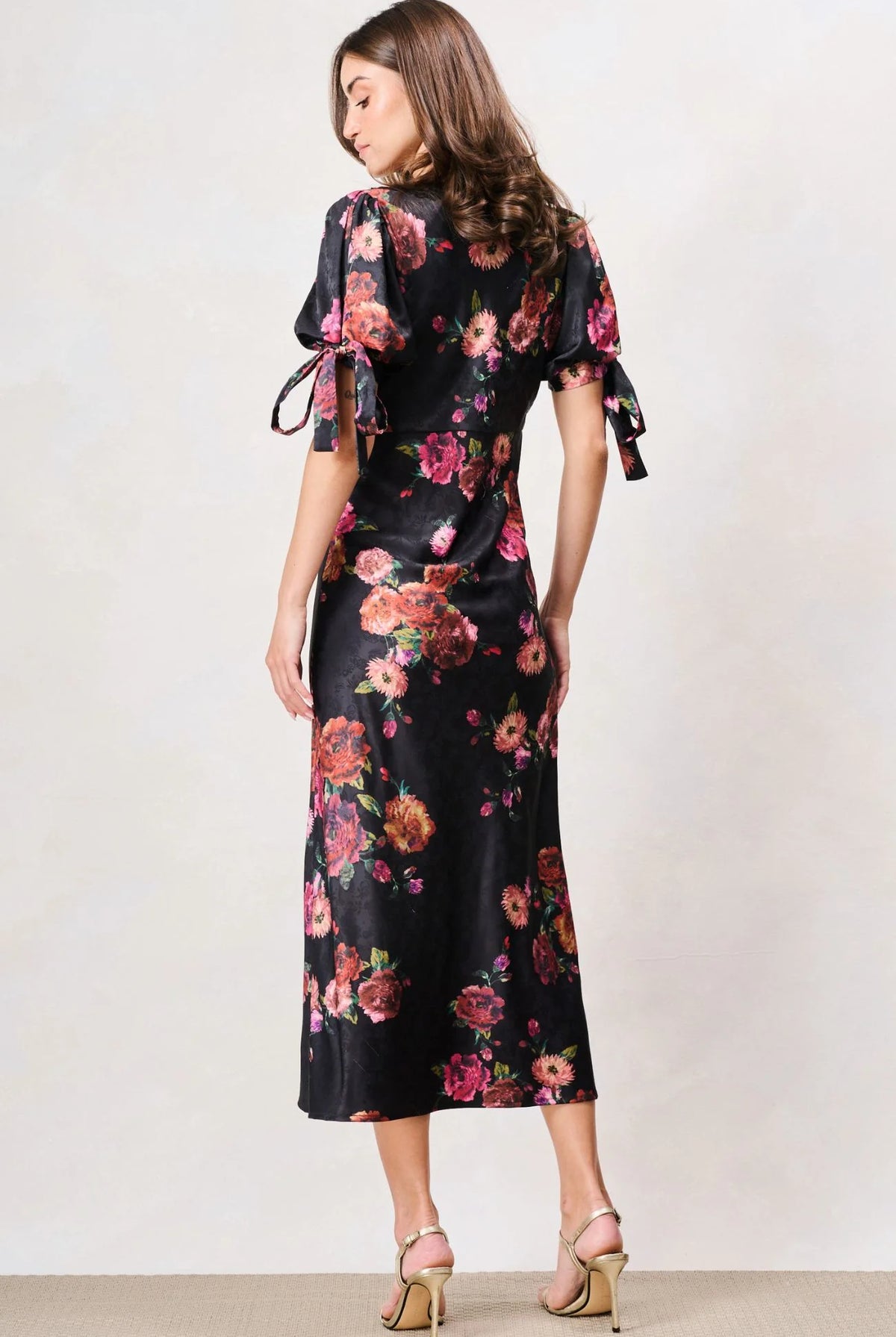 Hope & Ivy Tanya black floral lace-trim midi dress with bow sleeves – three-quarter model view
