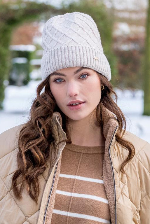 HV Society Juul beige diamond knit beanie hat styled on model