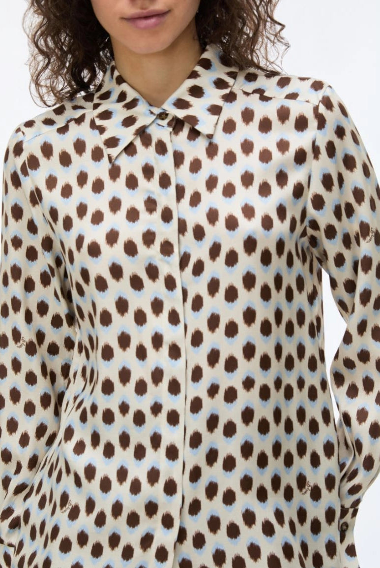 Close-up of iBlues Iblodissea ivory and brown polka dot shirt