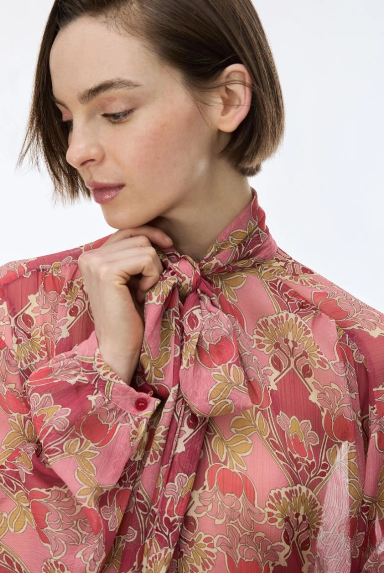 Close-up of iBlues Iblsecolo pink floral blouse with oversized tie neck