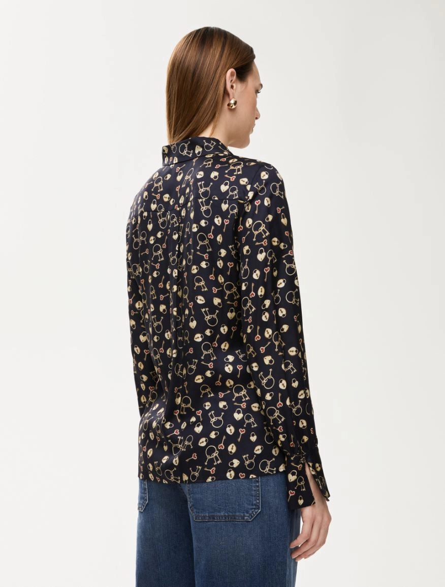 Back view of iBlues navy blouse with soft pleat detail