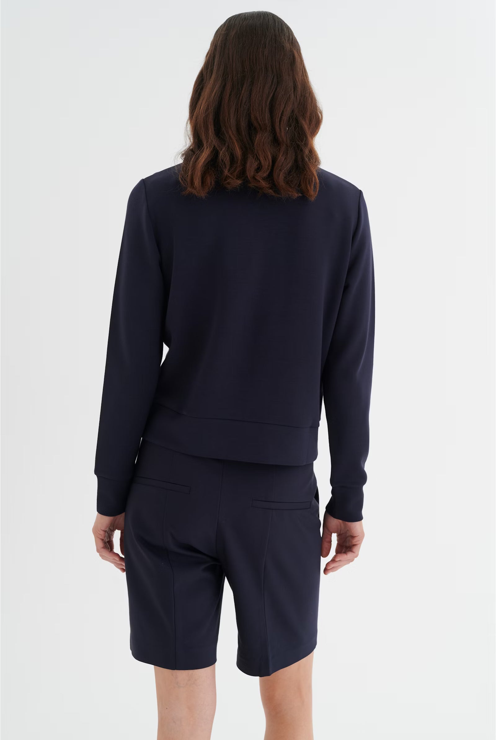 Rear view of InWear BecaI navy jacket with long sleeves and rib hem