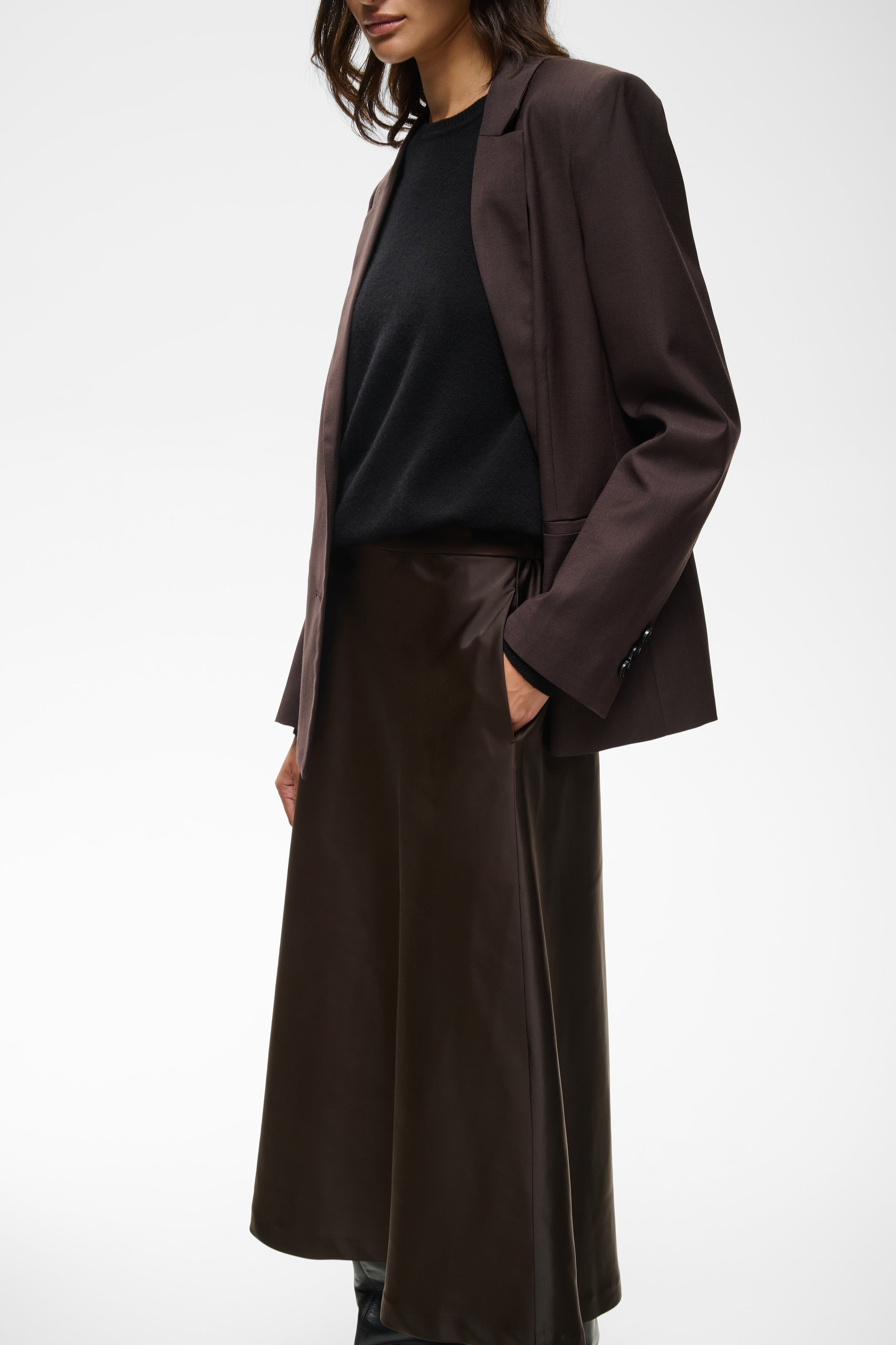 Side view of InWear Zilky flowing brown satin skirt