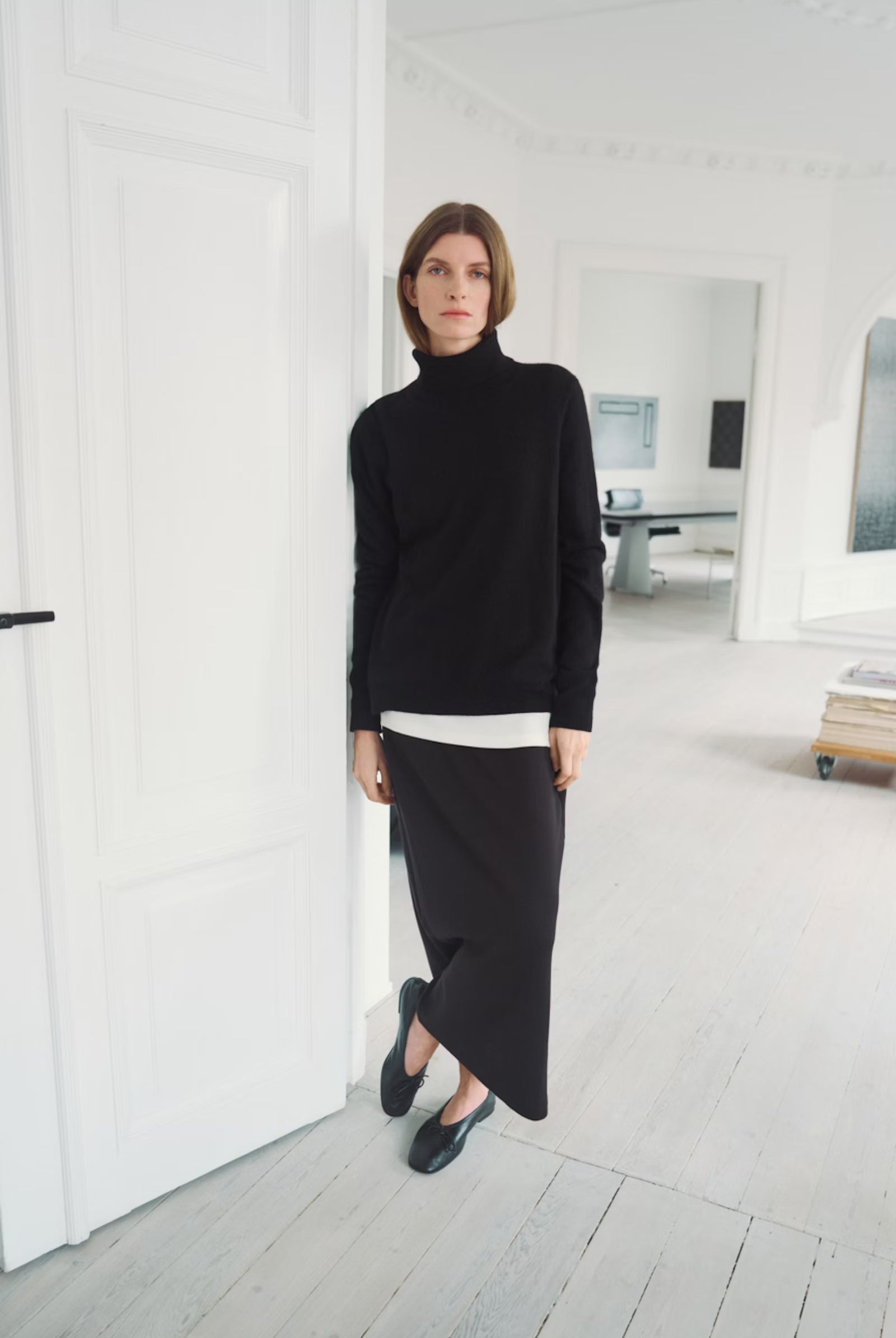 InWear AidaI skirt styled with relaxed black jumper For a comfortable work outfit